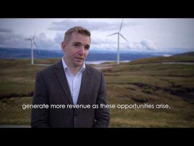 Exploring the benefits of high capacity wind turbines and community renewable projects