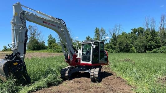 "Putting our Takeuchi to work at the new job site!" 